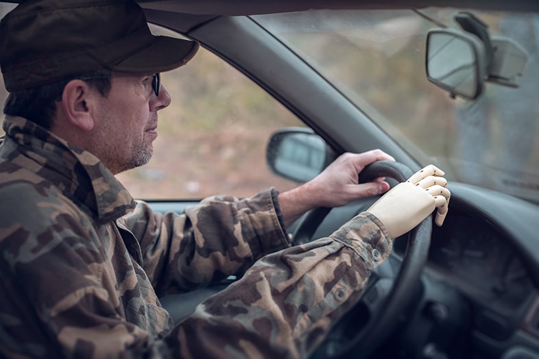 Army veteran driving his car down a Wisconsin road