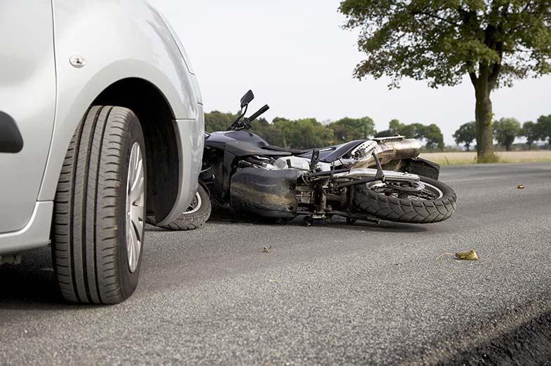 A black motorcycle on a Wisconsin road following an accident with a car