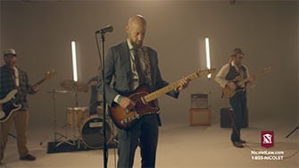 Russell Nicolet playing guitar in Super Bowl Commercial