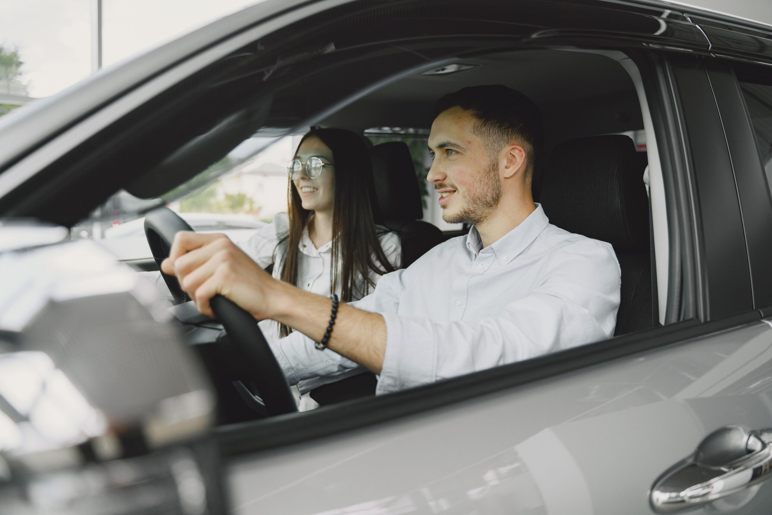 A man driving his car