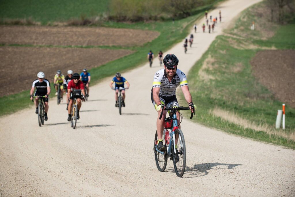 Cyclist navigating city traffic in the Midwest