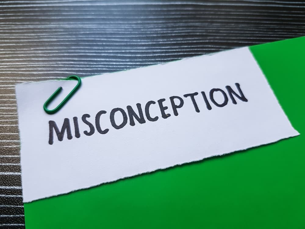 Misconception written on table background.
