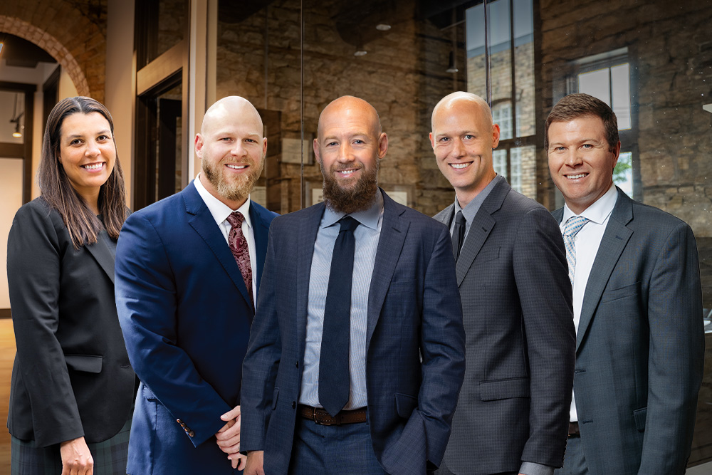 Group image of partners at the firm Nicolet Law