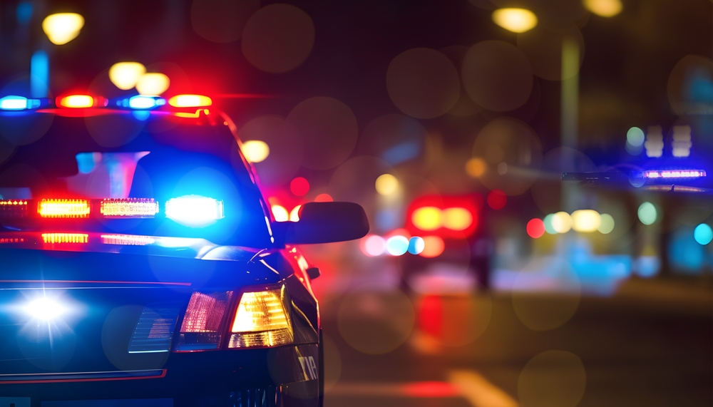 Police Cars with lights on at night